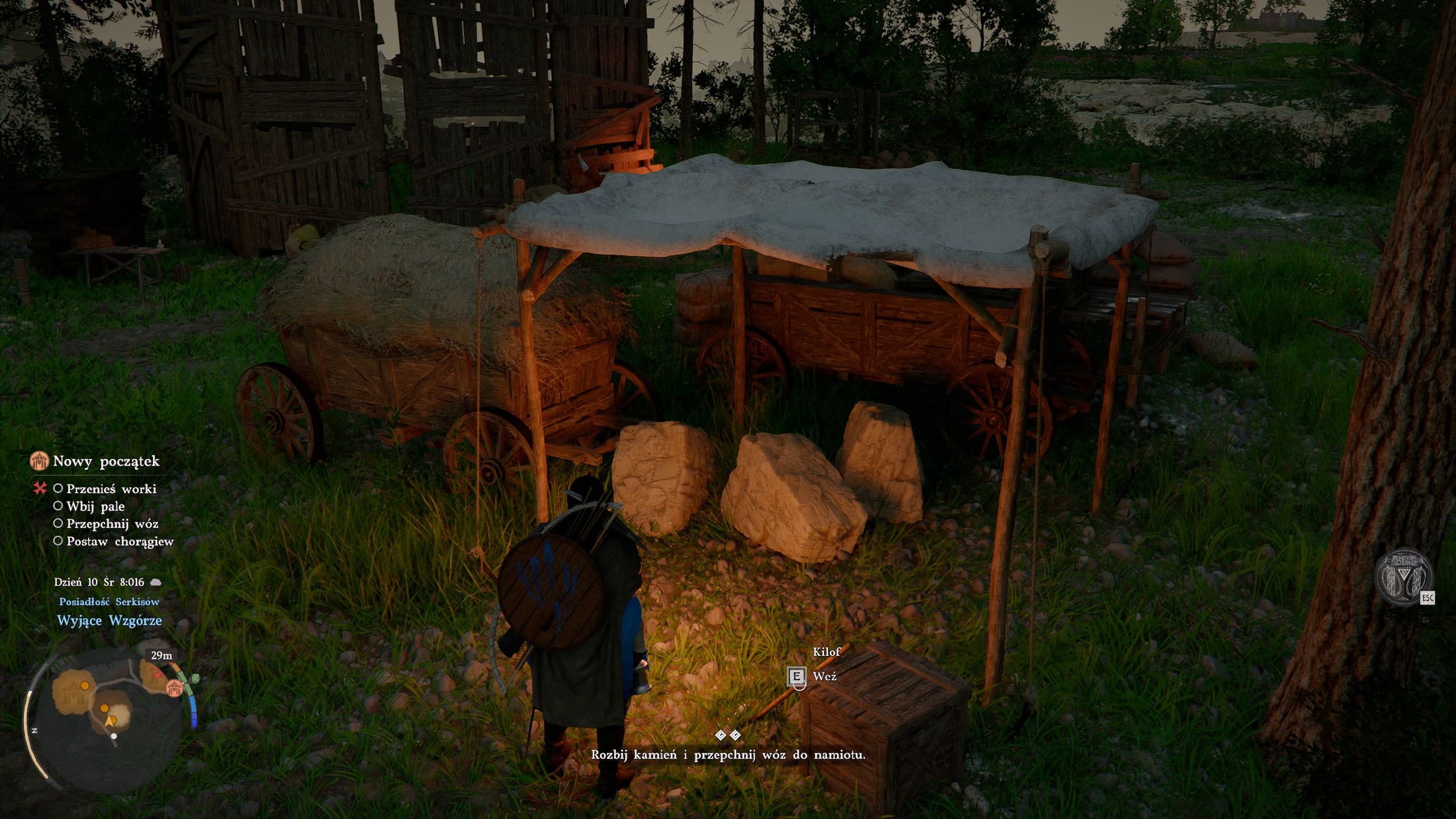 Crimson Desert - Nowy początek: kamień, wóz, pale, chorągiew