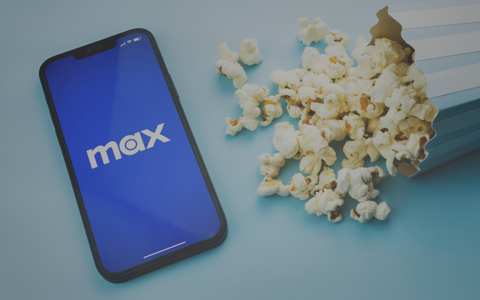 MAX logo z popcornem 